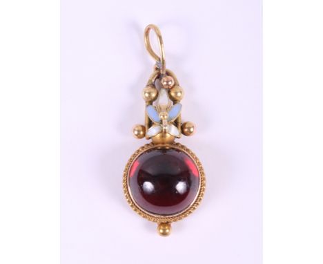 A Georgian gold and enamelled pendant set single garnet cabochonCondition: Loss/chip to enamel, small amount of soldering on 