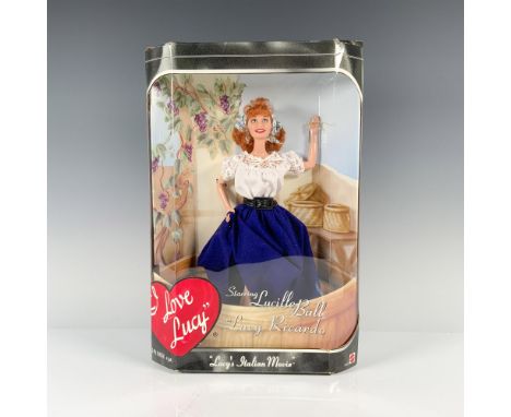 Lucille Ball elegantly adorned in a white blouse paired with a flowing blue skirt, cinched at the waist with a large belt, an
