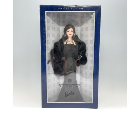 A timeless beauty, adorned in a timeless fashion. This doll showcases a classic reproduction of a 1956 gown by the world-famo