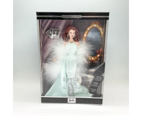 A Barbie Collectibles, and is the second in the Hollywood Movie Star Collection. Features Barbie in auburn hair color, and dr