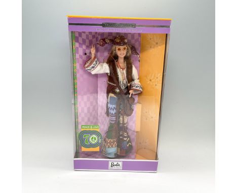 A Barbie Collectibles, and the seventh in the Great Fashions of the 20th Century collection. Barbie is shown in a long sandy-