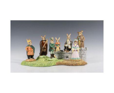 This Robin Hood Bunnykins grouping includes Little John Bunnykins DB243, Robin Hood Bunnykins DB244, Maid Marion DB245, Friar