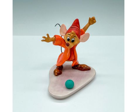 Jaq Mouse stands in an excited pose as he spots trimming on the floor in front of him. This item has its original box which m