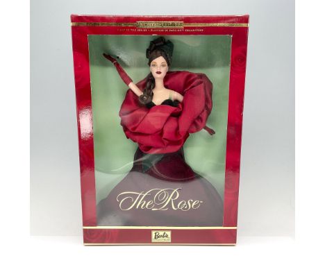 This doll is the first in the Series, Flowers in Fashion Collection. New in original box. #29911 Issued: 2000Dimensions: 9.5"