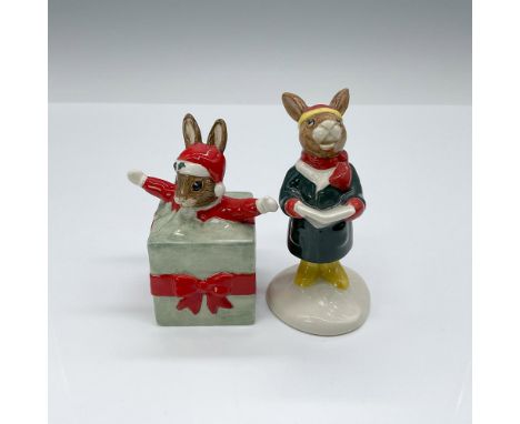 Figurines include Christmas Surprise DB 146, featuring a bunny jumping out of a light green gift, and Carol Singer DB104, dep