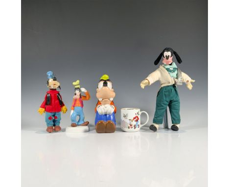 A set of 5 Disney items featuring a figurine of Goofy in his classic outfit, a mug capturing Goofy sitting with his knees rai