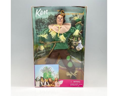 Ken in the iconic scarecrow costume with a floppy hat and bits of straw peeking out. UPC: 074299258169. Doll #25816. This ite