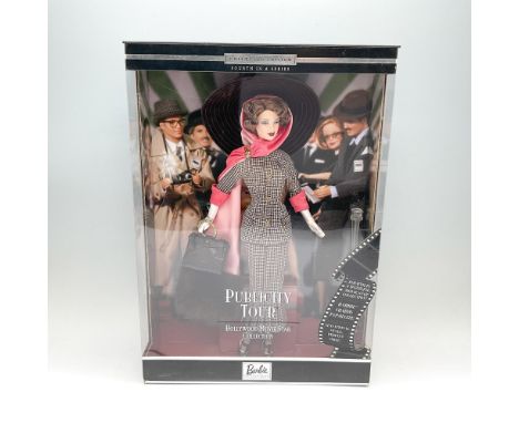 A Barbie Collectibles, and is the fourth in the Hollywood Movie Star Collection. Barbie in chestnut hair color dressed in a f