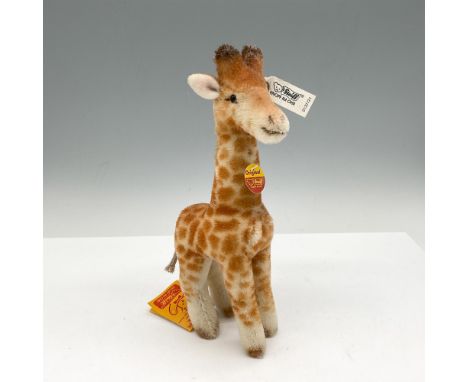 Made of genuine mohair this adorable toy is soft and huggable. Limited edition 2445 of 5000. Steiff original ear tag. Issued:
