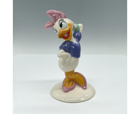 This porcelain figurine depicts Daisy Duck in her traditional high heels and hair bow. Part of the Mickey Mouse Collection. 7