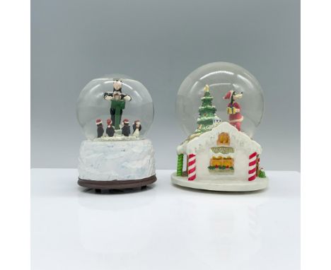 Delightful Disney-themed music boxes starring Goofy! One showcases Goofy as Santa, placing gifts under the tree, while the ot