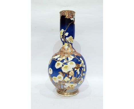 Japanese gourd-shaped pottery vase, blue ground with raised enamel blossom and butterfly decoration, black painted character 