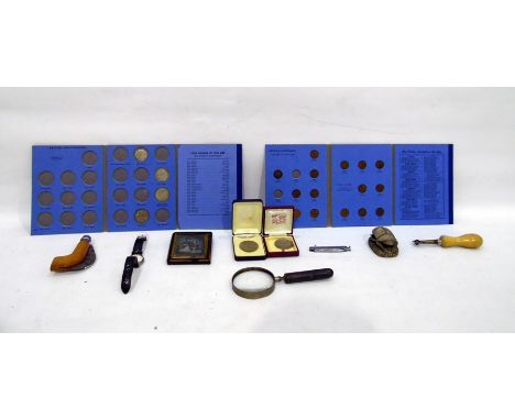 Assorted miscellaneous items to include a small collection of toys, compass, magnifying glass, hooked Opinel penknife, modern
