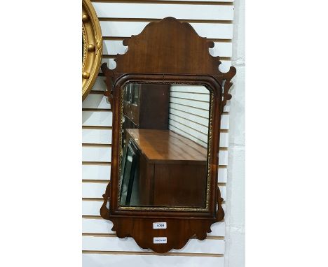 19th century mahogany Chippendale style wall mirror with parcel gilt frame and fret carved surround 