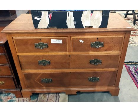 Edwardian oak chest of two short and two long drawers, on bracket feet, 107cm wide 