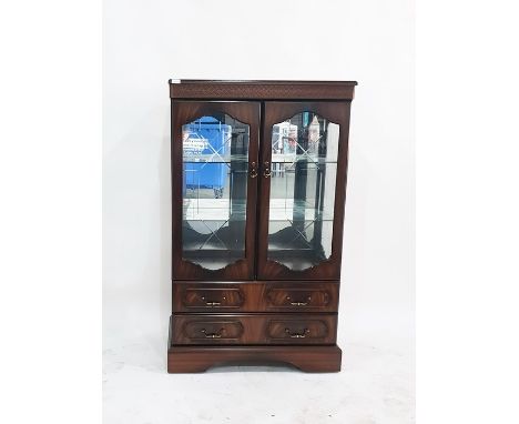 Modern dwarf mahogany finish display cabinet fitted two drawers and on stylised bracket plinth base, width 79cm 