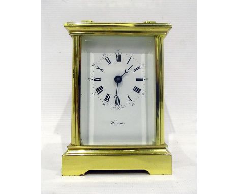 20th century brass English 'Worcester' carriage clock, enamel dial, shaped handle, 16cm high 