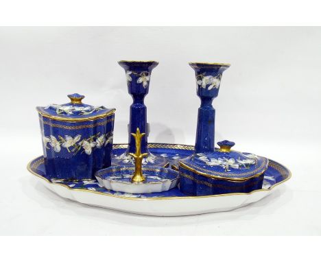 Wedgwood porcelain dressing table set, mottled blue ground with snowdrop pattern, comprising tray, pair of candlesticks, lidd