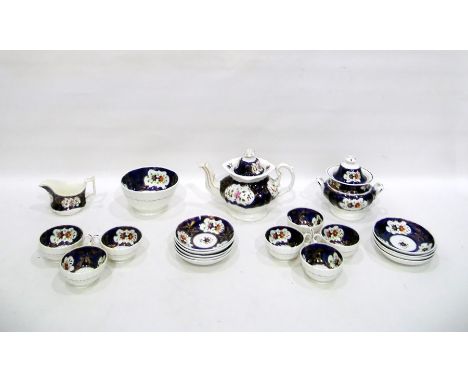 Victorian china part tea set, the baluster form teapot and sucriere hand-painted with flowers with cobalt blue and pink lustr