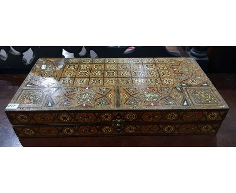 Finely inlaid Eastern backgammon box, the top opening to reveal the gaming board, inlaid with a fusion of different woods, mo