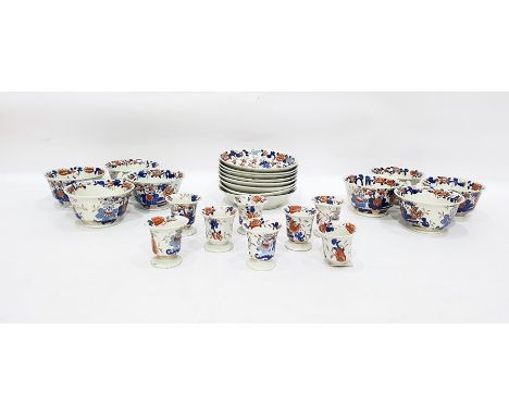 19th century Imari pattern pottery cups and saucers and a collection of eggcups (24)