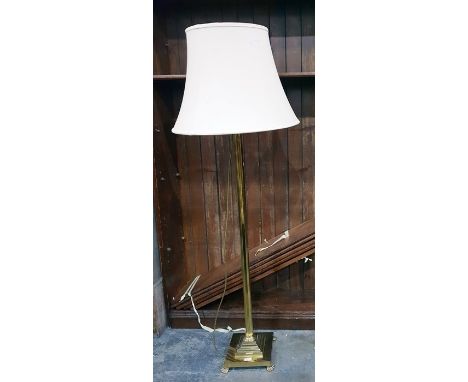 Brass lamp standard with fluted column, square stepped base with hare claw feet and with shade 