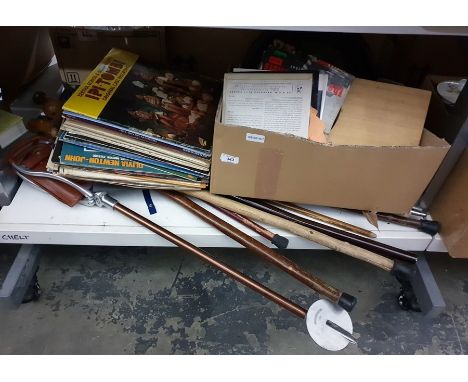 Collection of walking sticks, umbrellas, shooting stick, an ink blotter, an Ever Ready head torch in its original box and cas