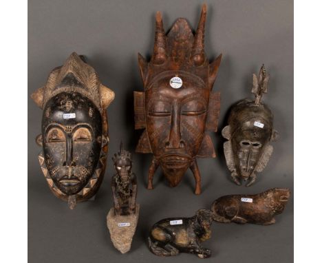 Konvolut Figuren und Masken. Afrika. Massivholz, geschnitzt / Bronze, H=9 cm bis 49 cm.
