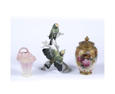 Karl Ens of Volkstedt porcelain bird group  marked to the base, 19cm high, Royal Worcester 'Roses' pot pourri jar, 15.5cm hig