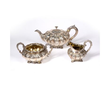 Georgian three piece matched silver tea set the teapot bearing marks for possibly Adam Elder, Edinburgh, 1831, 15cm high, 728