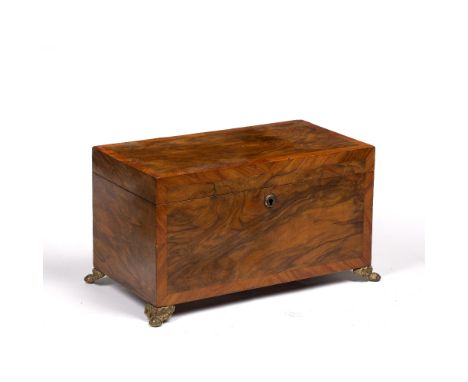 Walnut tea caddy  19th Century, with fitted interior, on four brass feet, 33cm wide x 19cm high x 20cm deep overall 