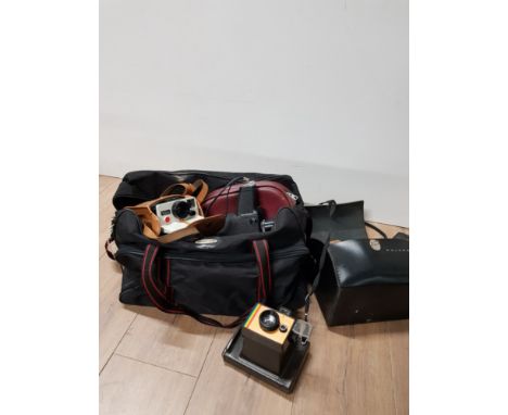A BAG CONTAINING ASSORTED CAMERAS INC POLAROID LAND CAMERA ETC