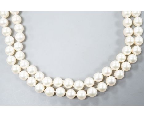 A modern single strand cultured pearl necklace, with diamond chip set spherical clasp, 72cm.