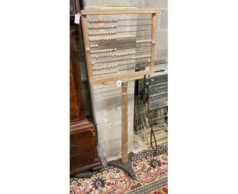 A Brown's decimal ball frame abacus, height 115cm