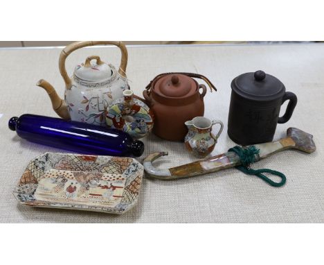 A group of Japanese Satsuma pottery, a Japanese red stoneware teapot, a Chinese Yixing jar and cover, a Middle Eastern dagger