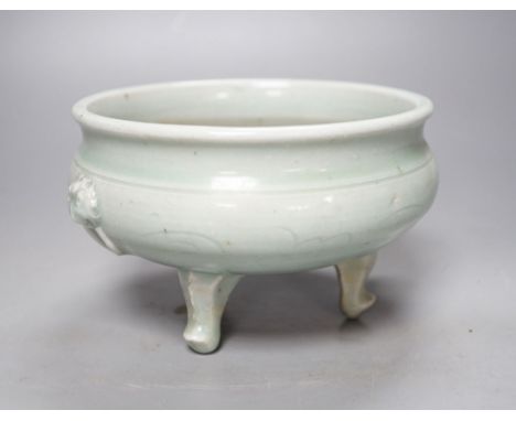 A Chinese celadon tripod censer, Ming or later, 16.5 cm diameter