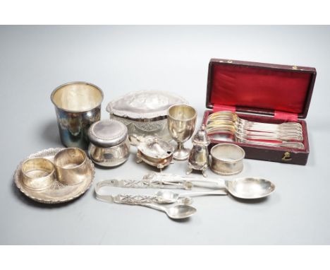 Sundry small silver, white metal and plated items, including a George III silver caddy spoon, French white metal beaker, napk