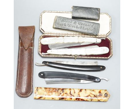 A leather cased pair of mother-of-pearl handled cut throat razors, by J Crawford and three other cased cut throat razors (4)