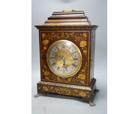 A Victorian floral painted mahogany bracket timepiece with key and pendulum 49cm