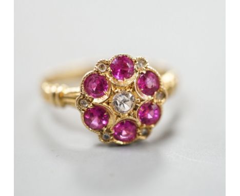 A George V 18ct gold, synthetic ruby, white sapphire? and diamond chip set cluster ring, size K, gross weight 2.4 grams.