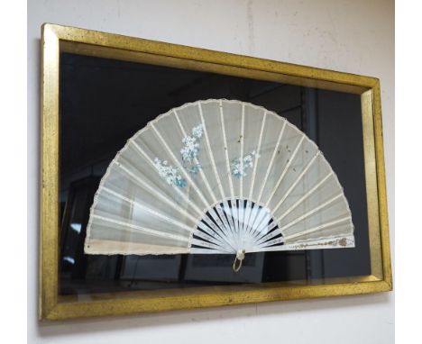 A framed 19th century French mother of pearl and painted silk fan, approx. 60cm long excl frame