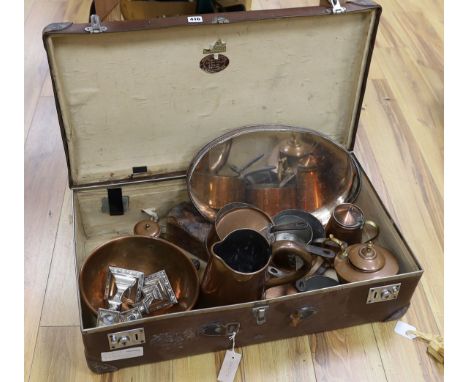 Copper and silver plated ware in trunk