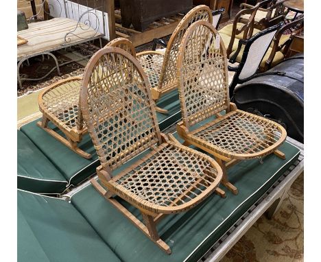 A set of four vintage American bentwood and animal gut folding canoe seats by Tubbs of Wallingford, width 40cm, depth 52cm, h