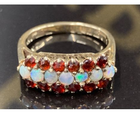 A 9CT YELLOW GOLD OPAL AND GARNET RING SIZE N 3.3G GROSS