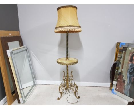 A BRASS AND ONYX STANDARD LAMP WITH SHELF AND BLUSH SILK TASSEL SHADE 183CM OVERALL