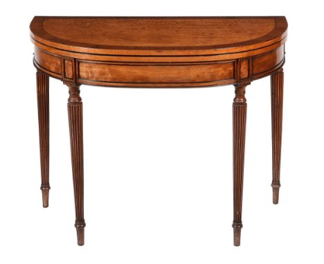  A George III satinwood folding card table  , circa 1790, the cross banded top opening to tooled baise playing surface, above