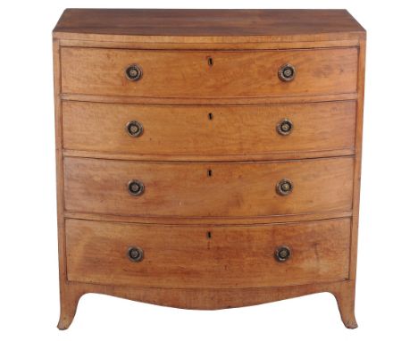  A Regency mahogany chest of drawers  , circa 1815, of bowfront outline, the caddy top above four long graduated drawers, sha