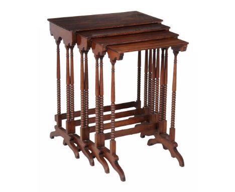  A set of mahogany quartetto tables  , first quarter 19th century, each with moulded edge above turned pillar and bobbin supp