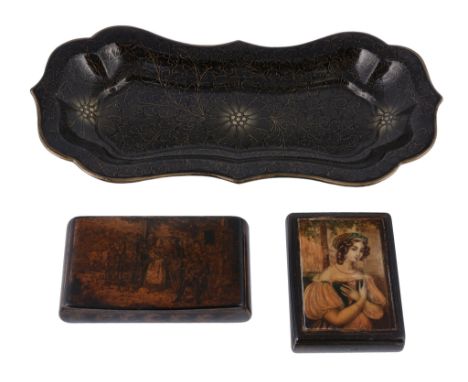  A papier mache shaped oblong pen or snuffers tray,   circa 1820, gilt painted with foliage overall, on a black ground, 26cm 