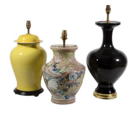  Three ceramic vases fitted as table lamps, in Chinese 18th century style,    modern, the largest example 57cm high overall 